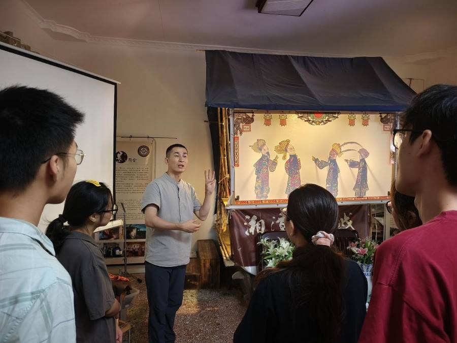 寻纸影奥秘，承文化新篇——记实践团调研升平轩纸影博物馆
